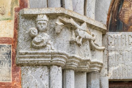 Photo for Stone carving on the walls of the Moraca monastery in Montenegro. The Moraca Monastery is a Serbian Orthodox monastery located in the valley of the Moraca River in Kolasin, central Montenegro - Royalty Free Image