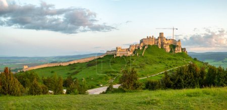 Photo for Panorama of the Spis castle at sunrise, Unesco World Heritage Site, Slovakia. Spissky hrad medieval castle. Spis Castle in the town of Spisske Podhradie in Slovakia. - Royalty Free Image