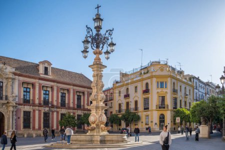 Photo for Seville, Spain - April 21, 2022: Fuente de la Farola fountain on Plaza Virgen de los Reyes square in Seville, Andalusia, Spain - Royalty Free Image