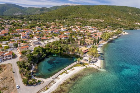 Photo for Aerial drone view of Karavomilos lake in Sami town, Kefalonia island, Greece. Ionian sea coast with beautiful beach, turquoise sea water and karst lake Karavomilos with crystal clear water. - Royalty Free Image