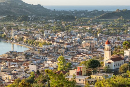 Photo for Beautiful cityscape of Zakynthos city from Bochali on Zante island in Greece. Holy Church of Panagia Pikridiotissa with beautiful view at Zakynthos town at sunrise. - Royalty Free Image