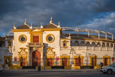 Photo for Seville, Spain - April 20, 2022: Real Maestranza bullring plaza toros de Sevilla, historic corrida arena in Seville at sunset, Andalusia, Spain. Arena Plaza de Toros de Maestranza. - Royalty Free Image