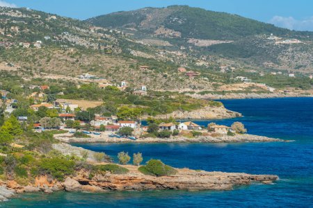Photo for Picturesque Mikro Nisi village at sunny day in Zakynthos Island, Greece, Europe. Small bay with turquoise sea water on Zante island. Greek holidays travel destination - Royalty Free Image
