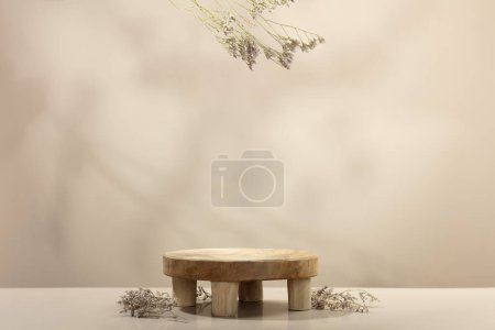 Téléchargez les photos : Empty round wooden podium for product presentation dry leaves on beige background abstract background. Minimal box and geometric podium. Scene with geometrical forms. Empty showcase for eco cosmetic - en image libre de droit