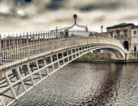 Photo for Dublin, Ireland. Waterfront and historic Ha'penny Bridge. - Royalty Free Image
