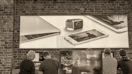 Photo for London, UK - June 2015: Interior of Apple Store with tourists and locals. - Royalty Free Image