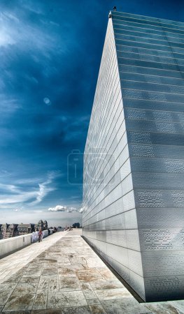 Photo for OSLO - JUN 6: Modern shapes of Opera House on June 6, 2010 in Oslo. The structure contains 1,100 rooms in a total area of 38,500 m2 (414,000 sq ft). - Royalty Free Image