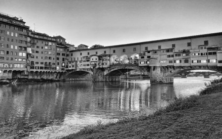 Photo for Old Bridge and Florence Lungarni at night. Panoramic cityscape of Firenze in Autumn, Tuscany - Italy - Royalty Free Image