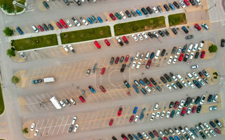 Photo for Overhead downward aerial view of city parking with many cars of different colors. - Royalty Free Image