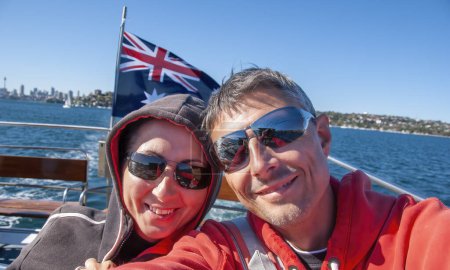 Photo for Selfie of a happy caucasian couple on vacation visiting Australian City. - Royalty Free Image