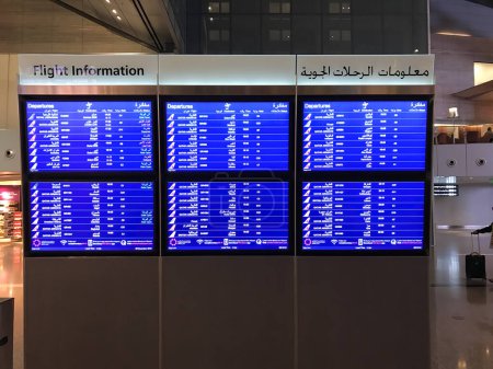 Photo for Doha, Qatar - December 3, 2016: Flight information screen at Hamad International Airport. - Royalty Free Image