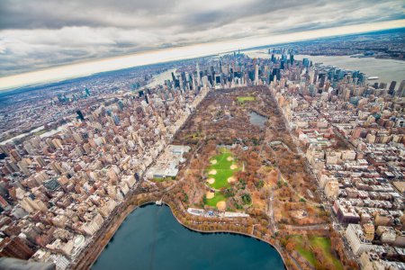 Photo for Manhattan Central Park and aerial skyline from helicopter in winter season, New York City - USA. - Royalty Free Image