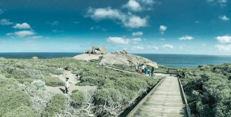 Photo for Kangaroo Island, Australia - September 13, 2018: Cape Du Couedic with tourists. Panoramic aerial view of Remarkable Rocks. - Royalty Free Image
