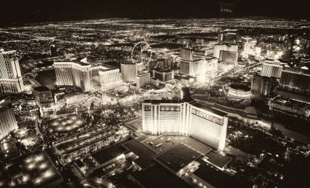 Photo for LAS VEGAS, NV - JUNE 30TH, 2018: Helicopter night aerial view of The Strip and main city Casinos and Hotels - Royalty Free Image
