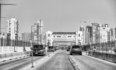 Photo for Vancouver, Canada - August 10, 2017: Traffic along the bridge to Granville Island - Royalty Free Image