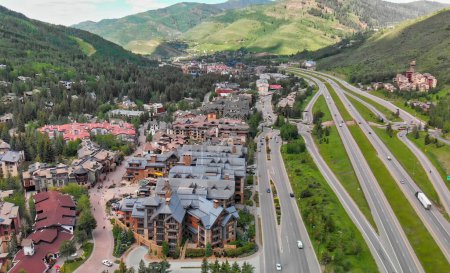 Photo for Vail city center and surrounding mountains, Colorado. Aerial view from drone in summer season. - Royalty Free Image