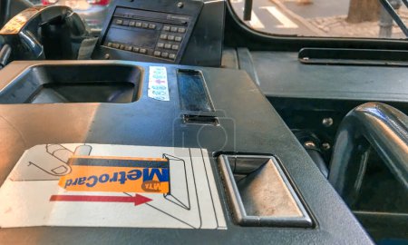 Photo for New York City - October 2015: Metrocard machine on a city bus. - Royalty Free Image