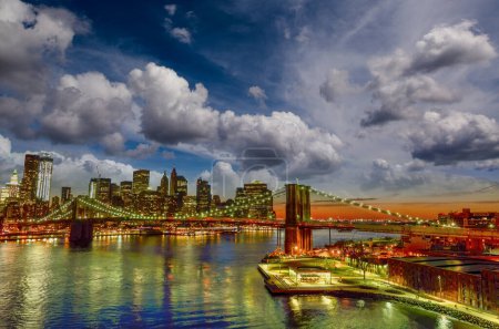 Photo for Skyline of New York City at sunset from Manhattan Bridge. - Royalty Free Image