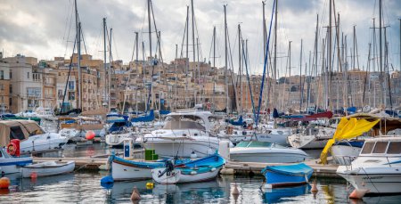 Photo for Valletta, Malta - April 17, 2022: Boats in the port of the Three Islands. - Royalty Free Image