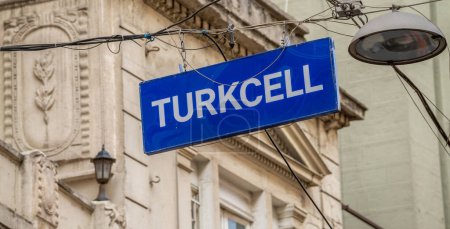 Foto de ISTANBUL - SEP 14, 2014: Turkcell sign on Istiklal Caddesi. Turkcell is the first Turkish company to be listed on the New York Stock Exchange. - Imagen libre de derechos