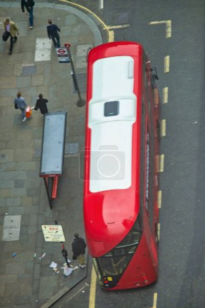 Photo for Downward aerial view of Red Double Decker London Bus. - Royalty Free Image