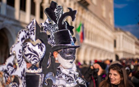 Photo for Venice, Italy - February 8th, 2015: People masquerading at the famous Venice Carnival. - Royalty Free Image