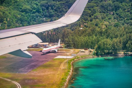Aerial view of Mahe' Island Airport from airplane, Seychelles.