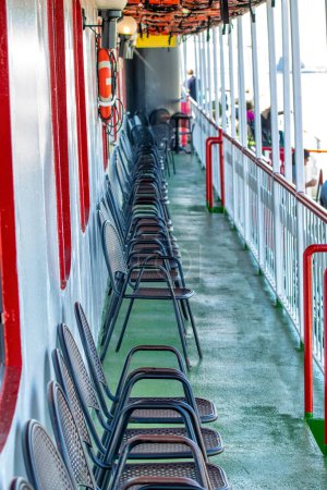 Photo for Colorful tourist boat, exterior view of chairs and terrace. - Royalty Free Image