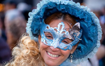 Photo for Venice, Italy - February 8th, 2015: People masquerading at the famous Venice Carnival. - Royalty Free Image