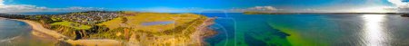 Photo for Panoramic aerial view of Phillip Island and San Remo coastline at sunset, Australia - Royalty Free Image