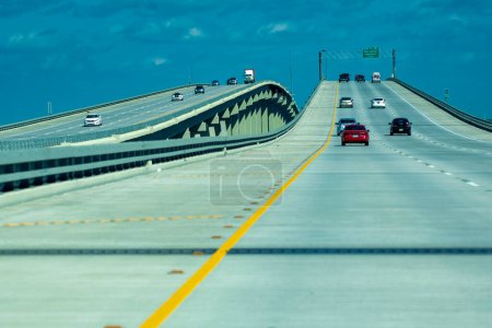 Photo for Road traffic to New Orleans over an interstate bridge. - Royalty Free Image