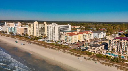 Photo for Aerial view of Myrtle Beach, South Carolina. Buildings and beach at sunset. - Royalty Free Image