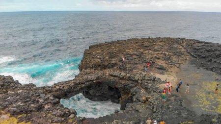 Pont Naturel, Mauritius Island. Beautiful arch rock formation from a drone viewpoint.
