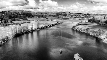 Téléchargez les photos : River and hills of North Island, New Zealand in spring - aerial view. - en image libre de droit