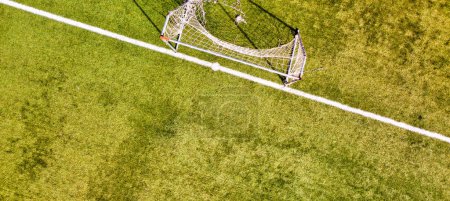 Photo for Soccer field in the countryside, aerial view from drone. - Royalty Free Image
