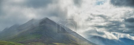 Photo for Rain falling on the green Mountains, summer storm. - Royalty Free Image