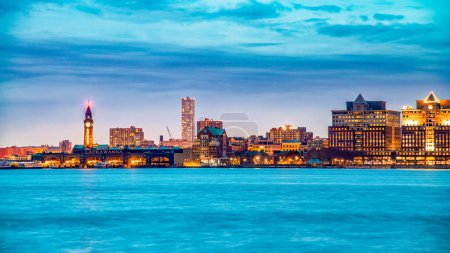 Téléchargez les photos : Jersey City, NJ - December 1st, 2018: Buildings of Jersey City at night along Hudson River. - en image libre de droit