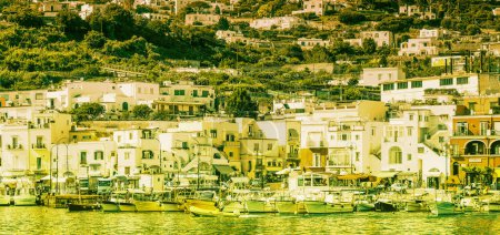 Photo for Panoramic view of Capri Island restaurants and shops along the port promenade, Italy. - Royalty Free Image