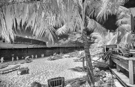 Photo for Turks and Caicos - February 2012: Infrared view of tourists enjoying the beautiful beach. - Royalty Free Image