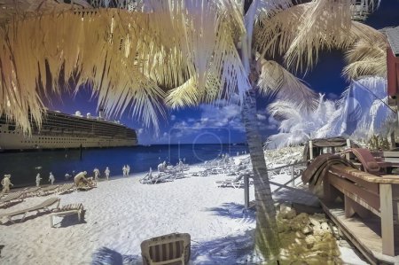 Photo for Turks and Caicos - February 2012: Infrared view of tourists enjoying the beautiful beach. - Royalty Free Image