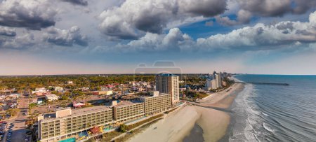 Foto de Aerial view of Myrtle Beach, South Carolina. Buildings and beach at sunset. - Imagen libre de derechos