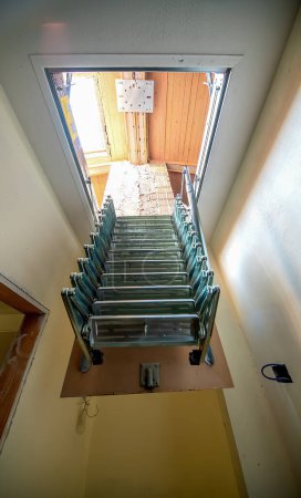 Photo for Stairway to the attic in a new house. - Royalty Free Image