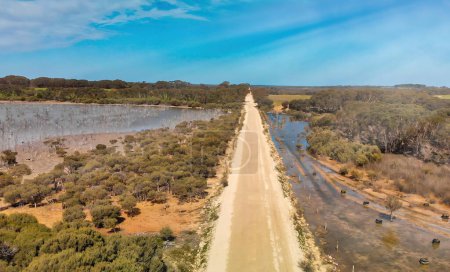 Photo for Aerial overhead view of road across swamps. - Royalty Free Image
