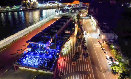 Photo for Madeira, Portugal - September 2, 2022: Aerial view of CR7 Disco with people dancing at night. - Royalty Free Image