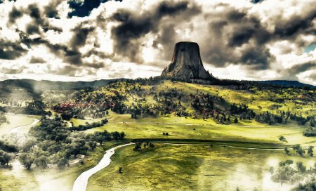 Photo for Aerial view of Devils Tower National Monument at summer sunset, Wyoming from drone perspective. - Royalty Free Image