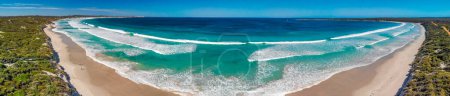 Téléchargez les photos : Kangaroo Island, Australia. Pennington Bay waves and coastline, panoramic aerial view from drone at sunset. - en image libre de droit