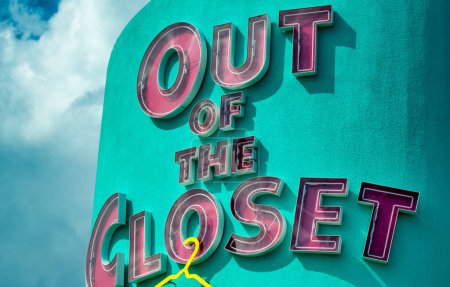 Photo for Out of the closet signage against a blue sky. - Royalty Free Image