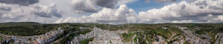 Photo for Aerial view of Setenil de las Bodegas, Andalusia. It is famous for its dwellings built into rock overhangs above the river, Spain - Royalty Free Image