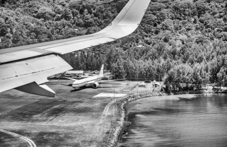 Photo for Aerial view of Mahe' Island Airport from airplane, Seychelles. - Royalty Free Image
