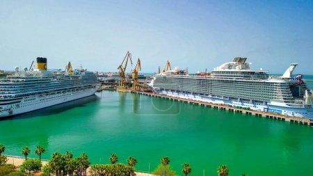 Photo for Cadiz, Spain - April 8, 2023: Cruise ship in the city port, aerial view from drone. - Royalty Free Image